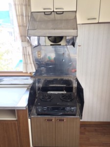 two burner Japanese range on top of cabinet where pots and pans can be stored